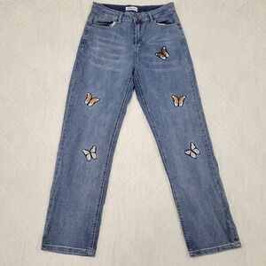 Between Us blue jeans w/ butterfly patches size 9